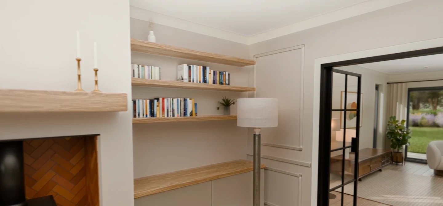 Natural materials, shelving and a quiet seating area in the proposed living room